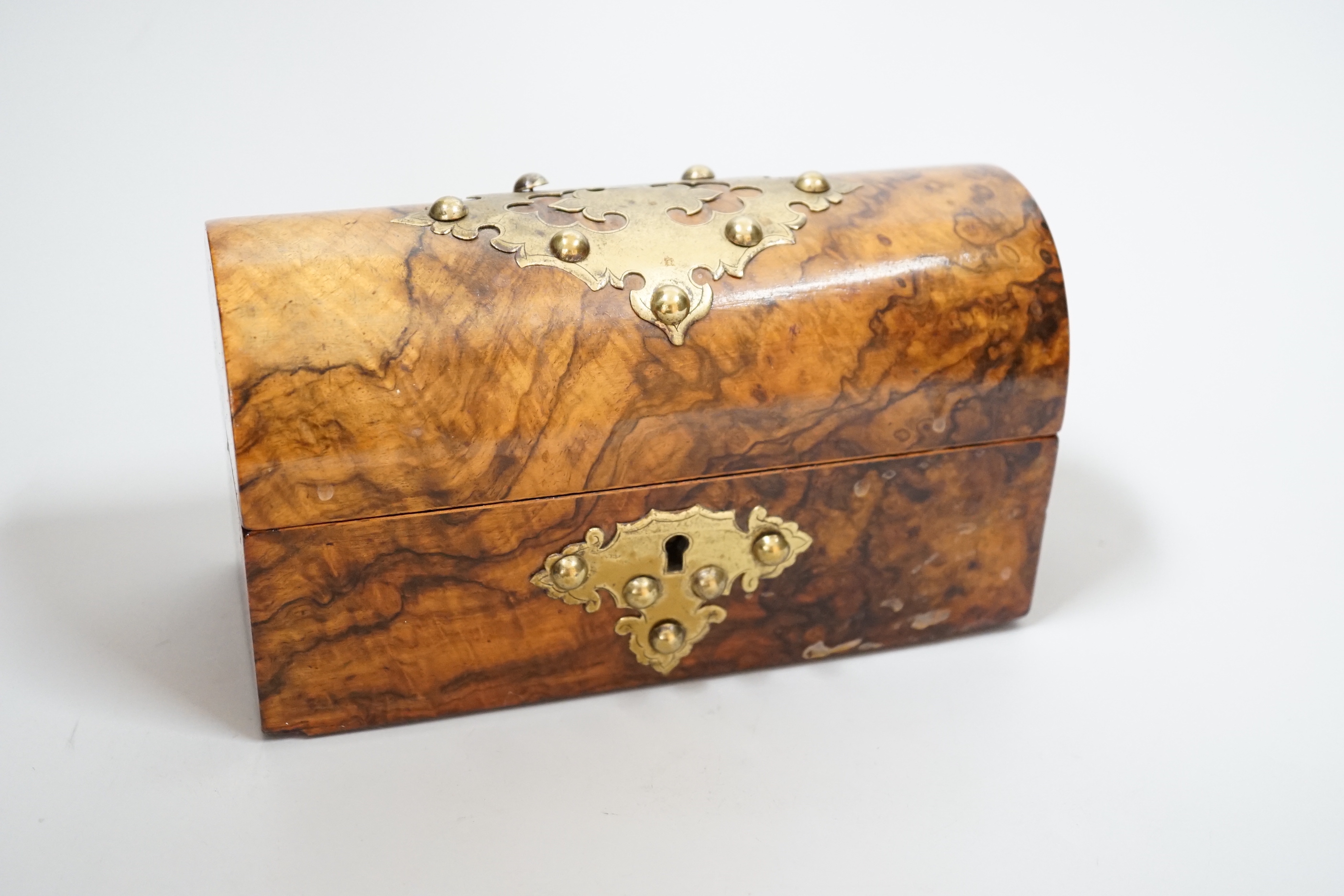 A walnut and brass-studded casket, 19.5cm wide, and a small lacquered box
